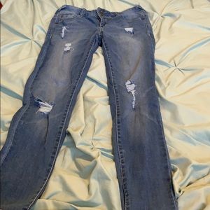 Ripped high rise skinny jeans